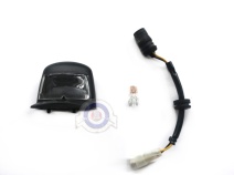 Vista frontal del piloto luz de matricula Vespa PX en stock